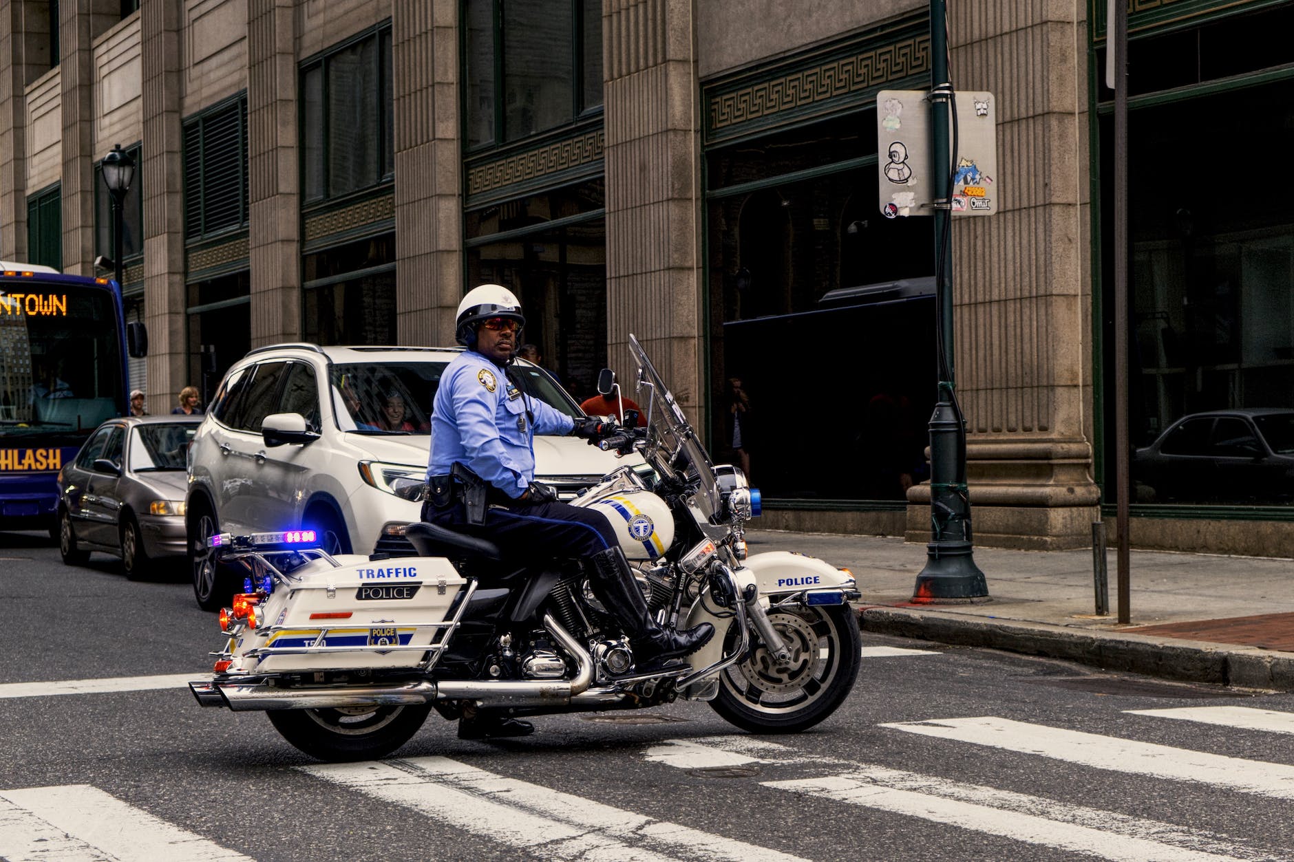 photo of man riding motorcycle