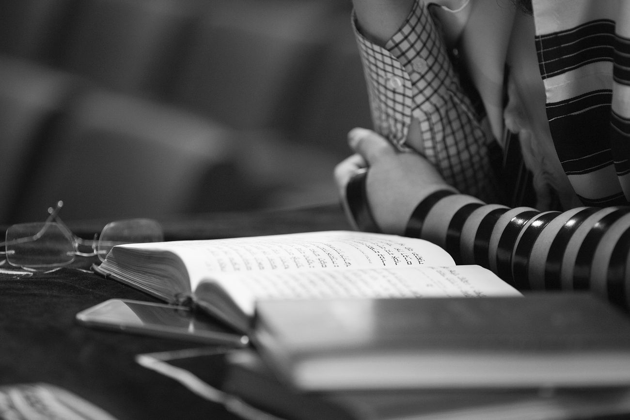 Woman reading a prayer book