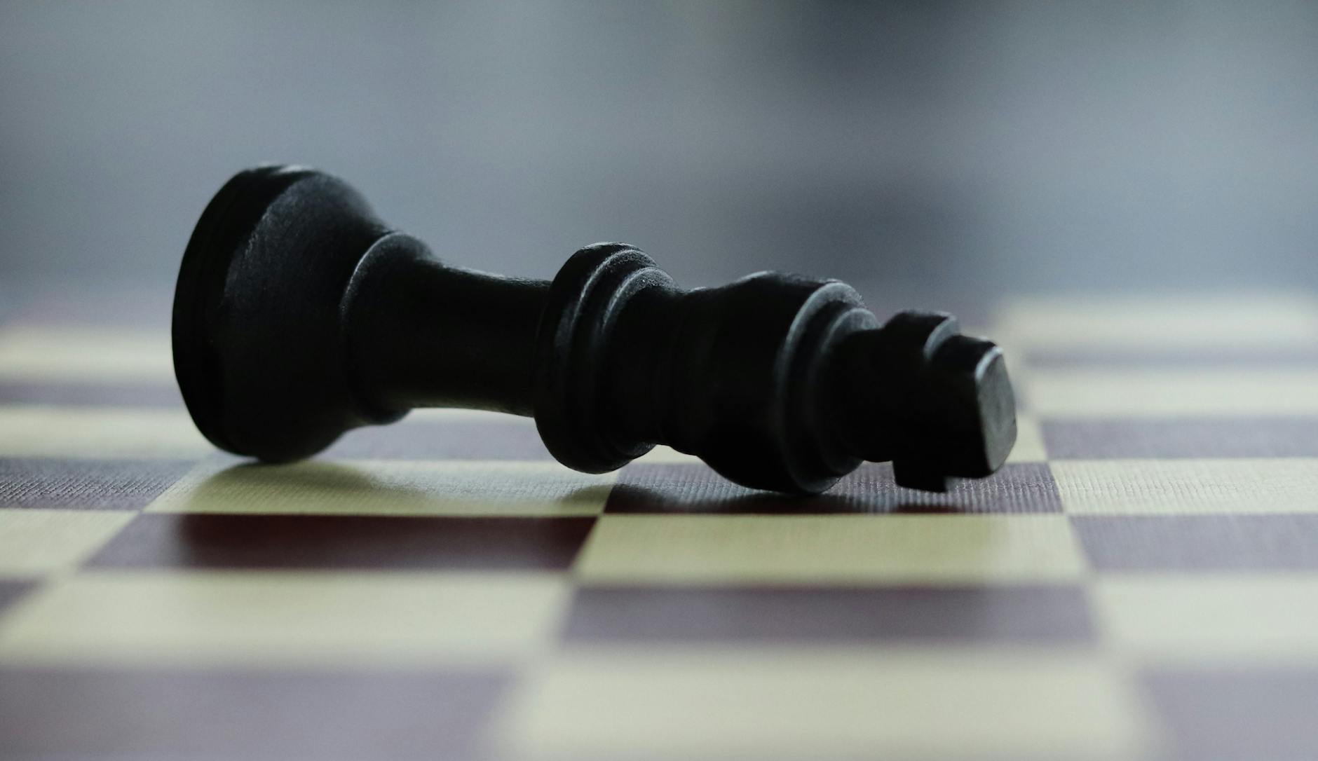 chess piece lying on the chessboard