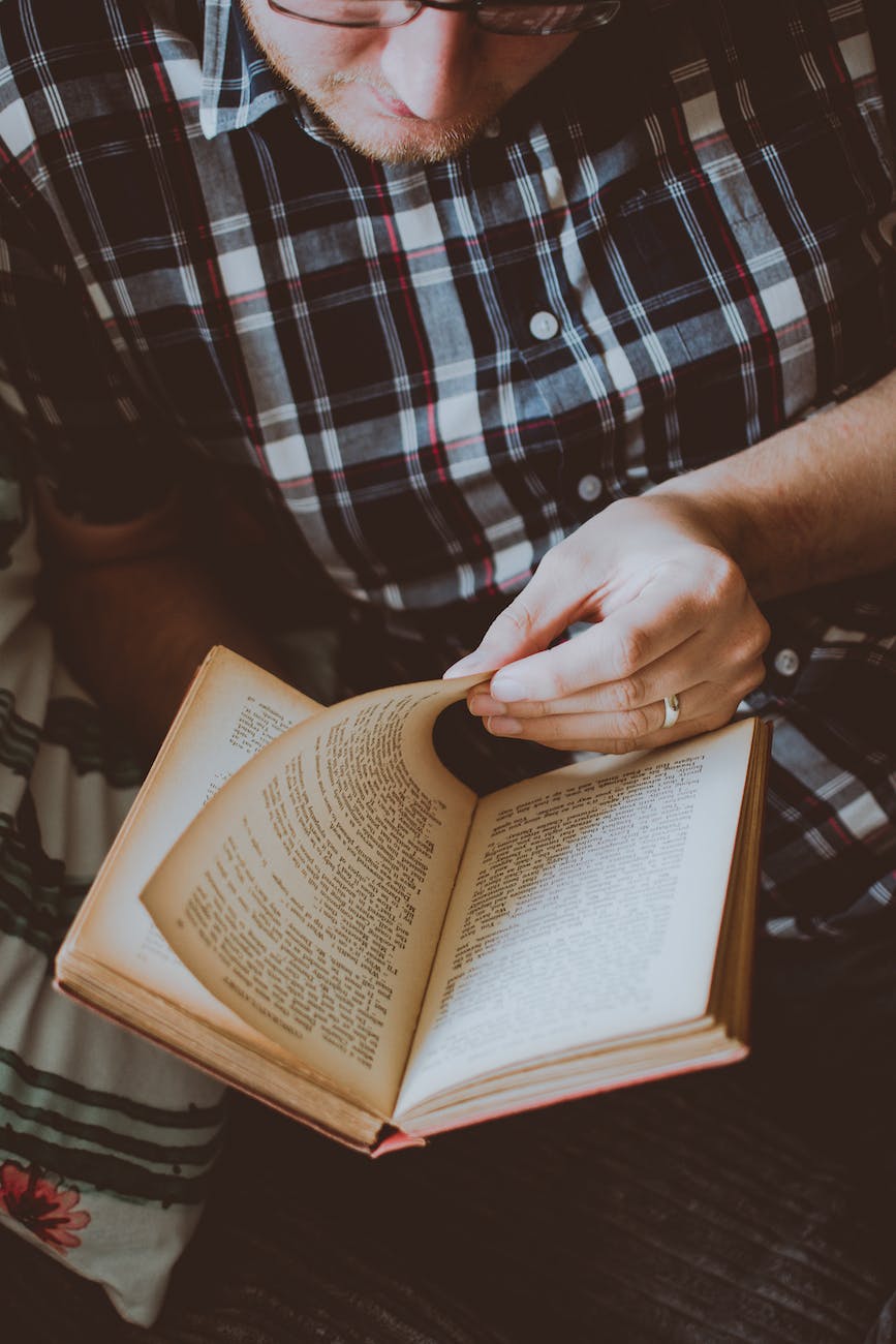 man reading book