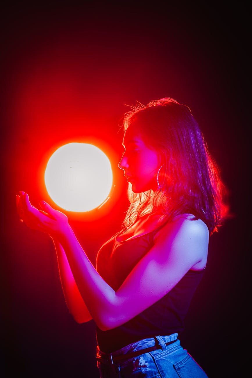 woman holding powered on ball