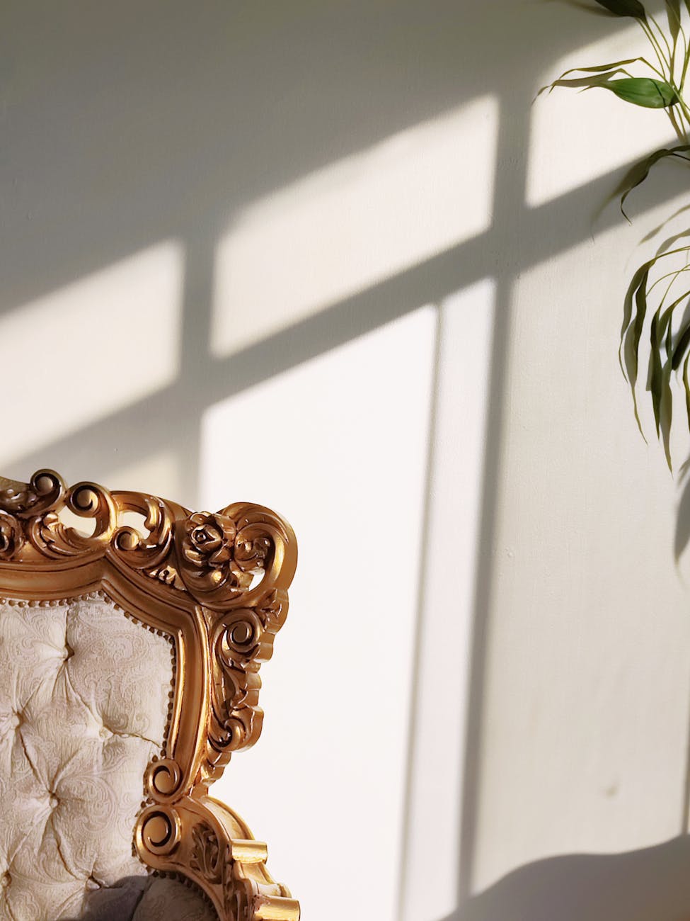 throne and sunlit wall behind