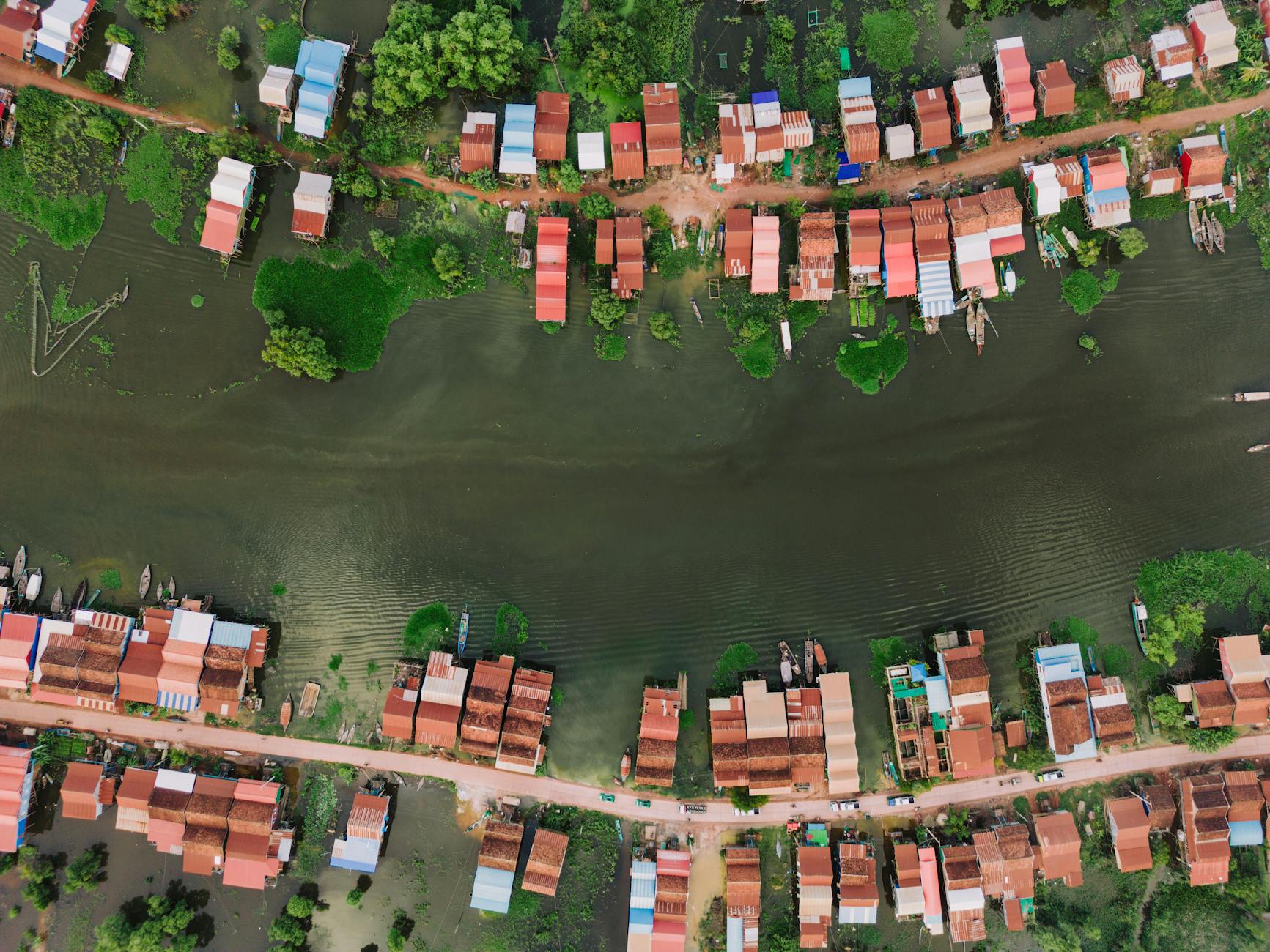 top view of a village with houses on the water